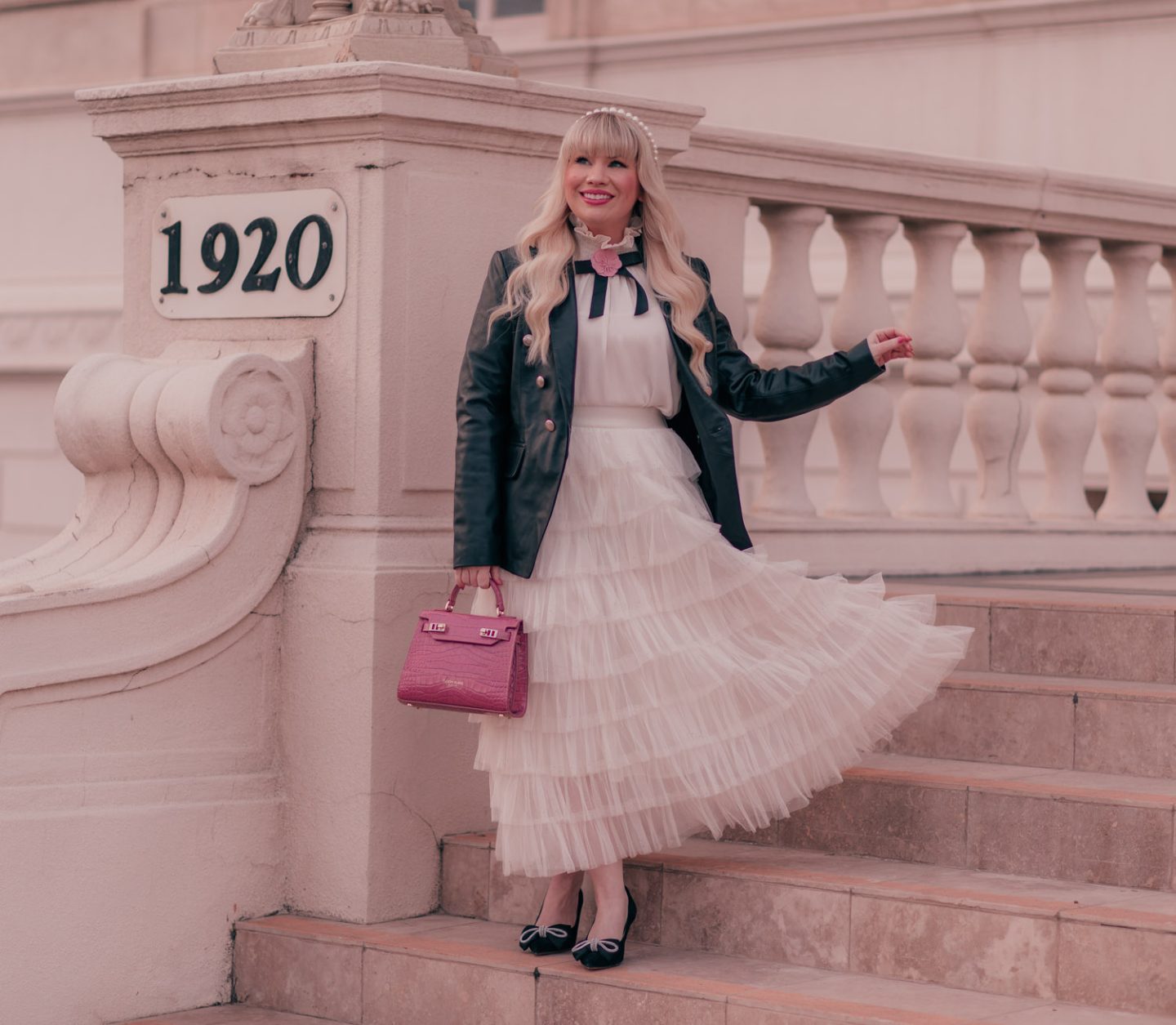 Feminine fashion blogger Elizabeth Hugen of Lizzie in Lace shares her honest FJackets Review featuring a black leather blazer outfit